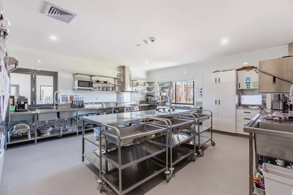 Professional commercial-grade kitchen with stainless steel equipment