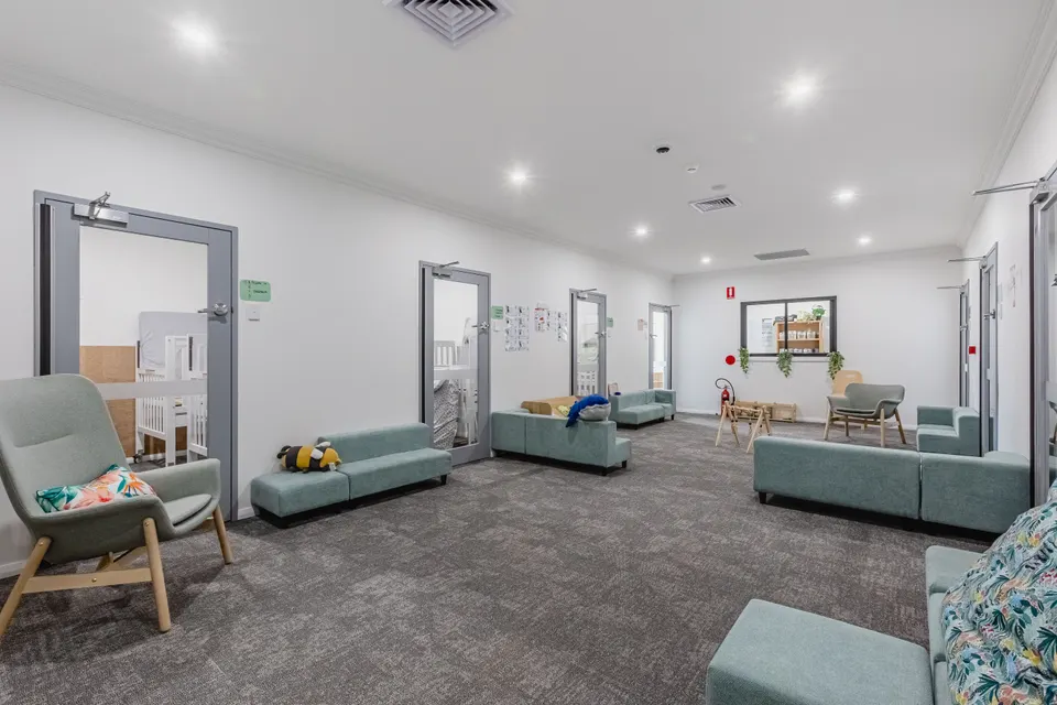 Calm sleep transition space with comfortable seating and natural light
